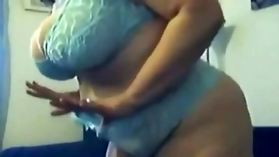 arabian black haired mature is making an erotic video for her lover and masturba