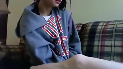 Petite emo girl gives her bf a blowjob on the sofa